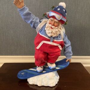 Festive Santa Snowboard Figurine